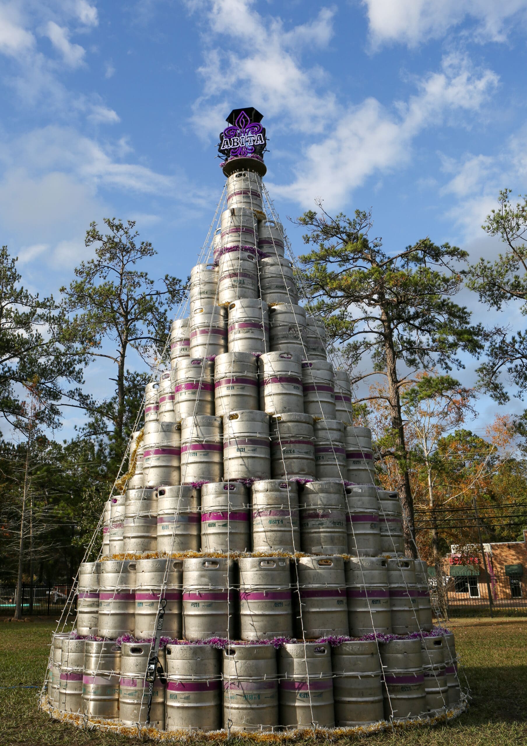 christmas tree made out of abita beer kegs in the beer garden at abita brewery