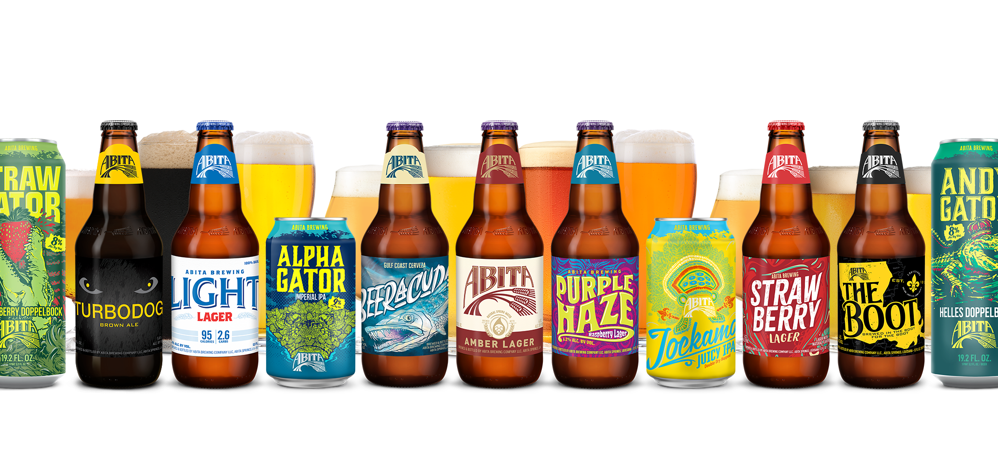 multiple beer brands from abita brewing company lined up with pint glasses behind each beer