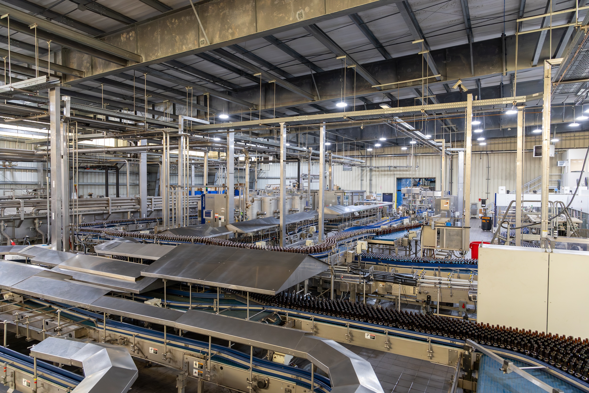 aerial view of how to start and open a brewery with full production capacity including conveyor belts